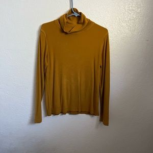 Uniqlo Orange Fleece Turtleneck